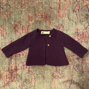 Monica and Andy purple cardigan